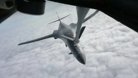 U.S. Air Force B-1B Lancer aircraft in-flight refueling with KC-135 Stratotanker Stock Footage 278272720