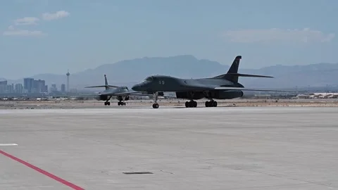 U.S. Air Force B-1B Lancer aircraft turning on flightline Stock Footage 281327488