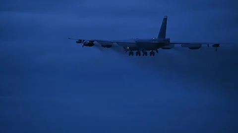 U.S. Air Force B-52 Stratofortress taking off at dusk Stock Footage 277262604