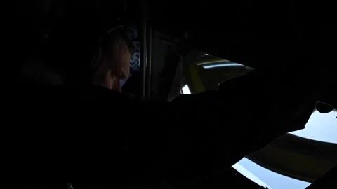 U.S. Air Force boom operator closing window on KC-135 Statrotanker Video stock 274193285