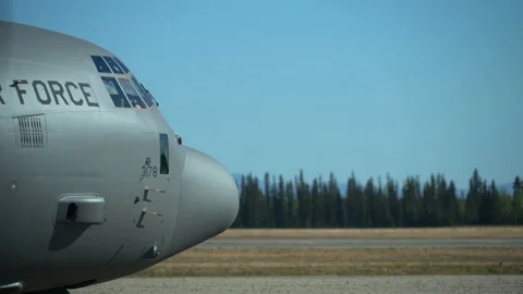 U.S. Air Force C-130 Super Hercules taxiing at Allen Army Airfield Stock Footage 108378340