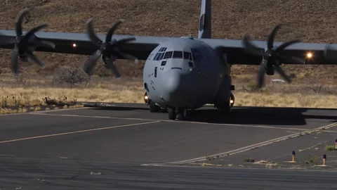 U.S. Air Force C-130 Hercules turning on runway during JPMRC 24-01 Stock Footage 254558093