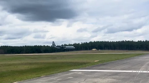 U.S. Air Force C-130 Hercules touching down at Camp Shelby, Mississippi Stock Footage 270054407