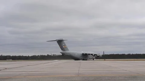 U.S. Air Force C-17 Globemaster III aircraft turning on flight-line Stock Footage 255780420