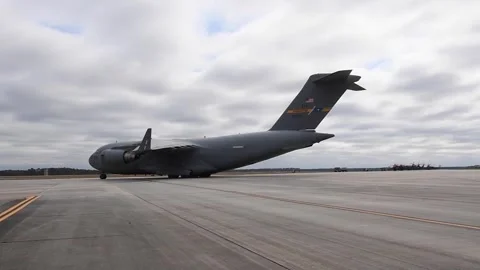 U.S. Air Force C-17 Globemaster III aircraft taxiing onto runway Stock Footage 255780460
