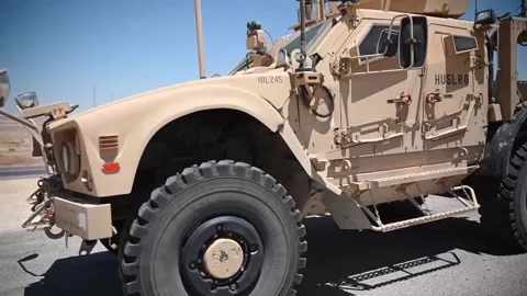 U.S. Air Force driving Mine-Resistant Ambush Protected All-Terrain Vehicle Stock Footage 201526794