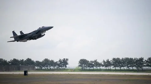 U.S. Air Force F-15 Eagle taking off from Kunsan Air Base, South Korea Stock Footage 274134341