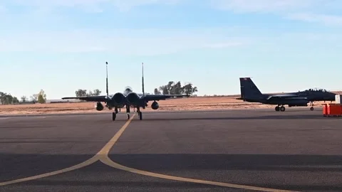 U.S. Air Force F-15E Strike Eagles taxiing along flightline Stock Footage 294335584