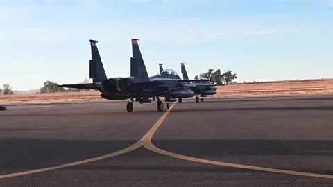 U.S. Air Force F-15E Strike Eagles taxiing on flightline Stock Footage 294335686