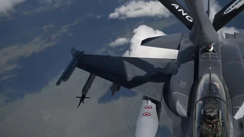 U.S. Air force F-16 fitted with conformal fuel tanks aerial refueling Video stock 277441891