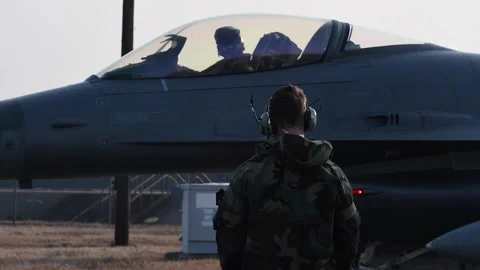 U.S. Air Force F-16 Fighting Falcon pilot getting ready for takeoff Stock Footage 299900940