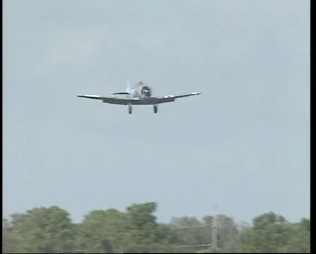 US Air Force Harvard (Texan) AT-6 fly by. Stock Footage 1075511