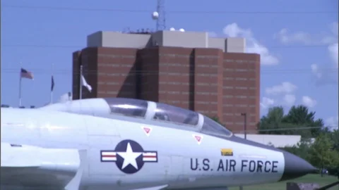 US Air Force Jet In Front of Building Stock Footage 88386589