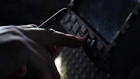U.S. Air Force KC-135 boom operator using on-board computer keypad Video stock 274193320