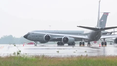 U.S. Air Force KC-135 Stratotanker taxiing during rainfall Stock Footage 276089297