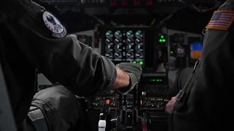 U.S. Air Force KC-135 Stratotanker pilot adjusting thrust levers during flight Stock Footage 295033690
