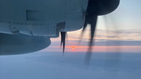 U.S. Air Force LC-130 Hercules aircraft flies above Arctic Circle at sunset Stock-Footage 236372925