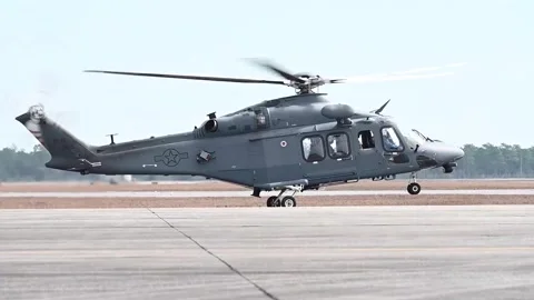 U.S. Air Force MH-139A Grey Wolf helicopter taking off from airfield Stock Footage 267835283