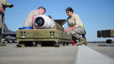 U.S. Air Force Munitions building and loading program with F-16 Stock Footage 83306878