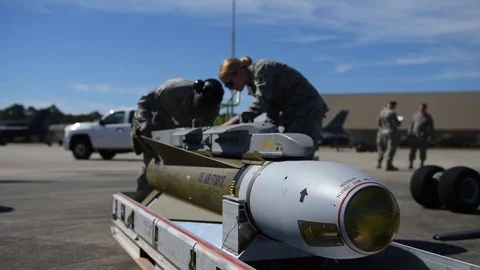 U.S. Air Force Munitions building and loading program with F-16 Stock Footage 83308445