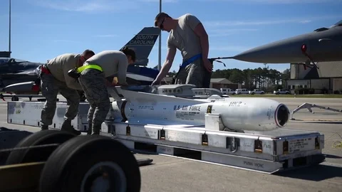 U.S. Air Force Munitions building and loading program with F-16 Stock Footage 83309634