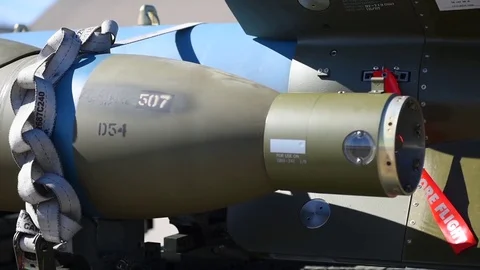 U.S. Air Force Munitions fitted to F-16 during building and loading program Stock Footage 83307316