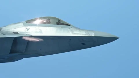 U.S. Air Force pilot flying F-22 Raptor aircraft Stock Footage 276414571
