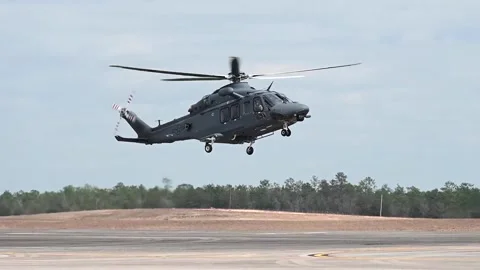 U.S. Air Force pilots flight training in new MH-139A Grey wolf helicopter Stock Footage 267835467