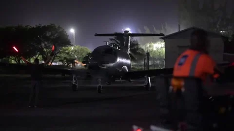 U.S. Air Force Special Operations U-28A Draco aircraft parking at night Stock Footage 270914867