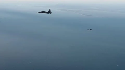 U.S. Air Force T-38C Talon and F-35A Lightning II aircraft in flight Stock Footage 255283918