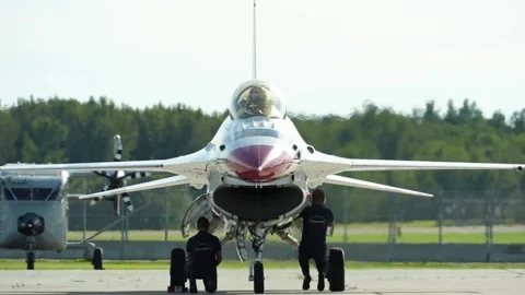 U.S Air Force Thunderbirds demonstration team maintainers synchronized movements Stock Footage 257413825