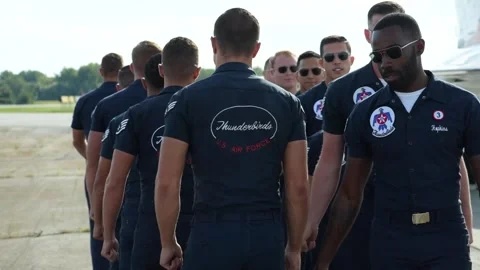 U.S. Air Force Thunderbirds demonstration team maintainers synchronized walk Stock Footage 257413839