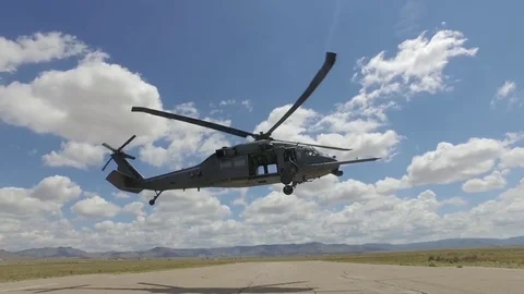 U.S. Air Force UH-60 Black Hawk helicopter hovering Stock Footage 85303034