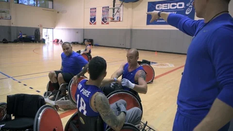 U.S. Air Force Warrior Games wheelchair rugby team hold practice game Stock Footage 106561029