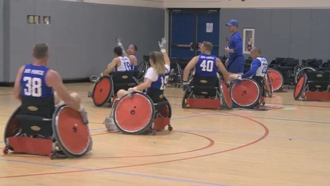 U.S. Air Force Warrior Games wheelchair rugby team hold practice game Stock Footage 106561074