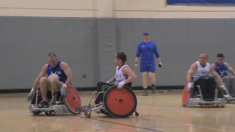 U.S. Air Force Warrior Games wheelchair rugby team hold practice game Stock Footage 106561089