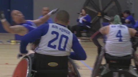 U.S. Air Force Warrior Games wheelchair team conduct rugby practice Stock Footage 106561094