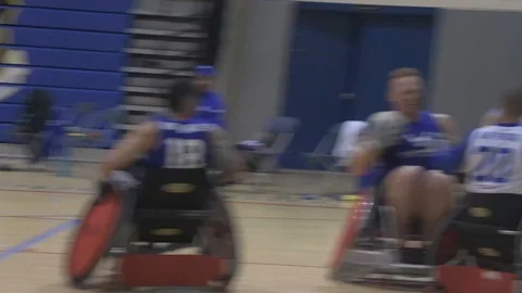 U.S. Air Force Warrior Games wheelchair team conduct rugby practice Stock Footage 106561124