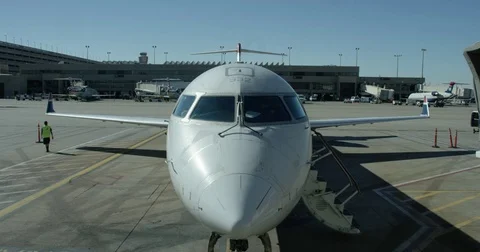 US Airways Express airplane cockpit. Crane shot up, camera tilt down. Stock Footage 73003177