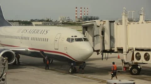 US Airways jet at terminal Stock Footage