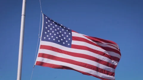 US American flag waves in wind Stock Footage 125051909