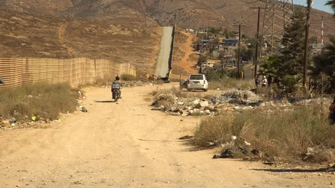 U.S. and Mexico Border Wall Stock Footage 97614223