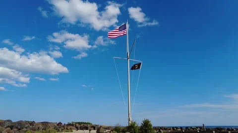 U.S. and MIA Flags wave in the wind Stock Footage 245735830