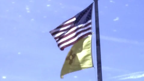 US and NM flags in wind Stock Footage 73516158
