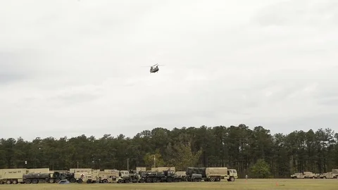 U.S and U.K. troops load CH-47 Chinooks during CJOAX 15-01 - 2015 Stock Footage 99980348