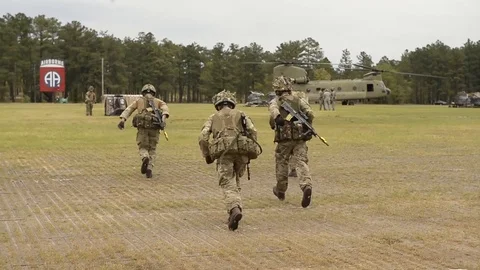 U.S and U.K. troops load CH-47 Chinooks during CJOAX 15-01 - 2015 Video stock 99980349
