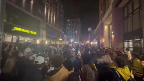 US: Ann Arbor Erupts in Celebration After Wolverines Win First NCAA Title... Stock Footage 332293713