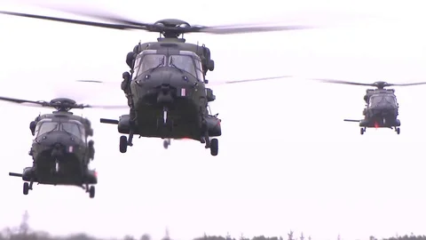 US Apache Helicopters Perform Air Maneuvers, Douglas AH-64 Apache Stock Footage 120948641
