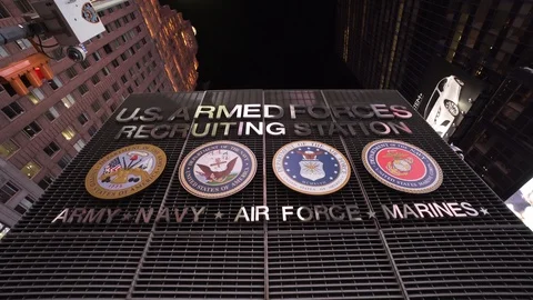 US Armed Forces Recruiting Station at night in Times Square of New York City Stock Footage 116740384