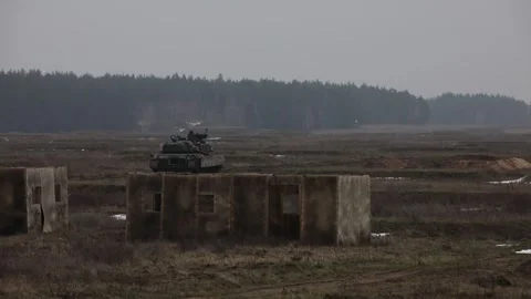 U.S. Army Abrams battle tank reversing on firing range Stock Footage 263294156